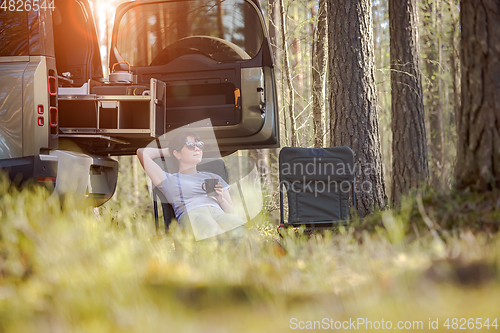 Image of Trip in the nature by car family vacation on the weekend.