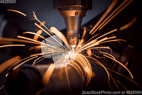 Image of CNC Laser cutting of metal, modern industrial technology.