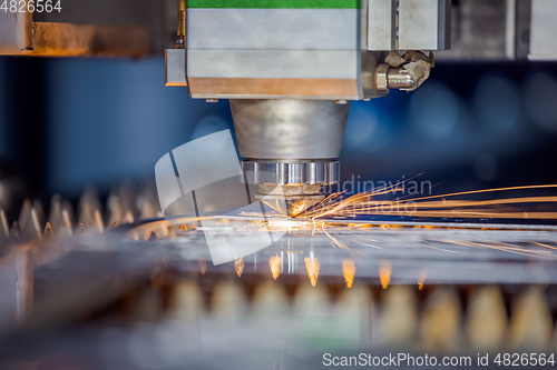 Image of CNC Laser cutting of metal, modern industrial technology.