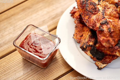 Image of grilled barbecue meat stack on plate