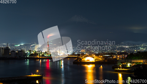 Image of Mountain Fuji and industry factory at night