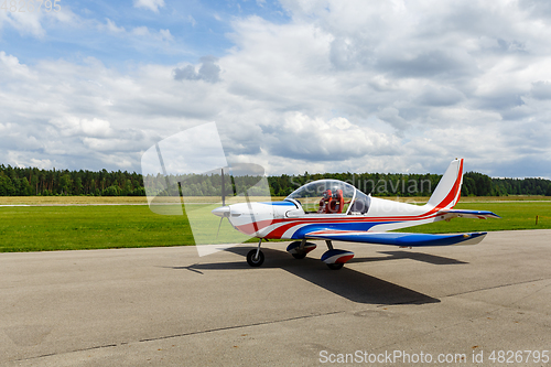 Image of outdoor shot of small plane before take-off