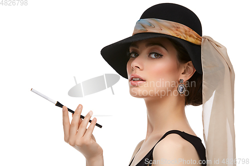 Image of beautiful young woman in retro style with cigarette