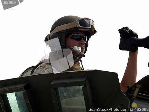 Image of American army gunner on tank