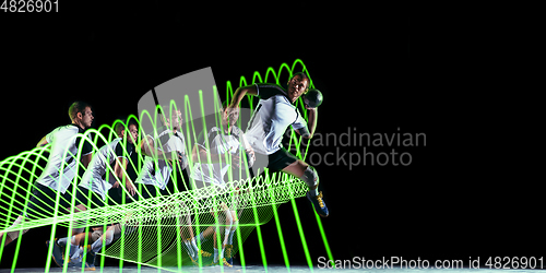 Image of Creative sport and neon waves on dark neon lighted line background