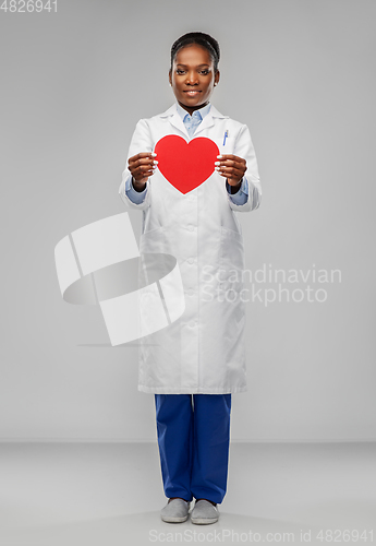 Image of african american female doctor with red heart