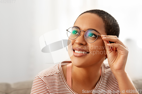 Image of portrait of african american woman in glasses