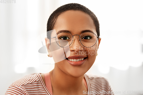 Image of portrait of african american woman in glasses