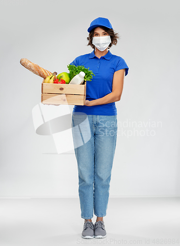 Image of delivery woman in face mask with food in box