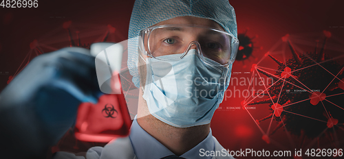 Image of close up of scientist and coronavirus hologram