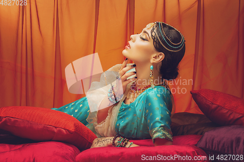 Image of beautiful arabic style bride in ethnic clothes