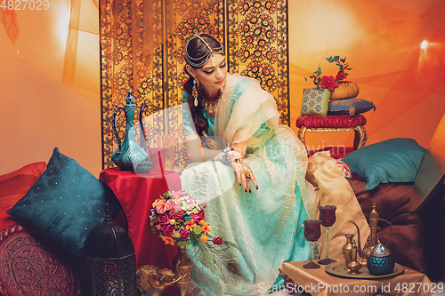 Image of beautiful arabic style bride in ethnic clothes