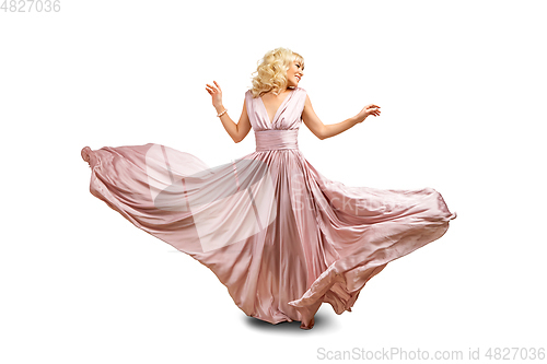 Image of girl in flying dress isolated on white background