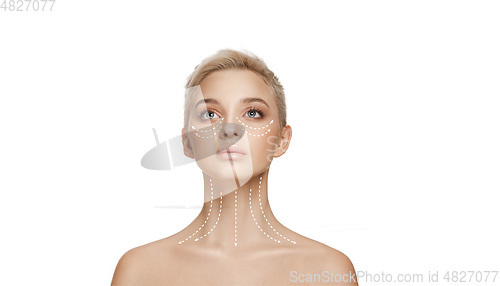 Image of Beautiful female face with lighting up arrows isolated on white background