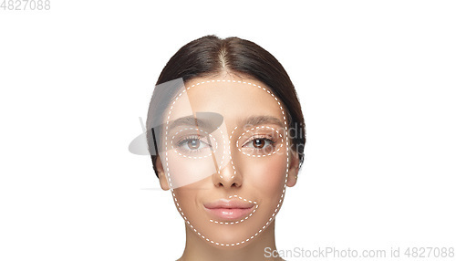 Image of Beautiful female face with lighting up arrows isolated on white background
