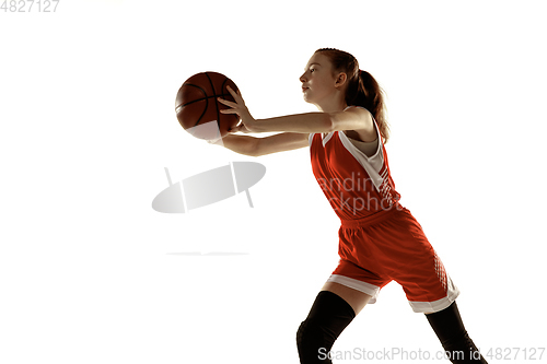 Image of Young caucasian female basketball player against white studio background