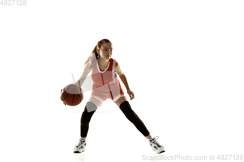 Image of Young caucasian female basketball player against white studio background