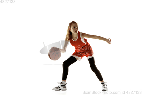 Image of Young caucasian female basketball player against white studio background