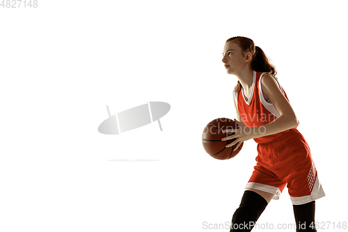 Image of Young caucasian female basketball player against white studio background