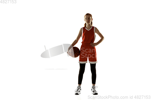 Image of Young caucasian female basketball player against white studio background