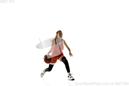 Image of Young caucasian female basketball player against white studio background