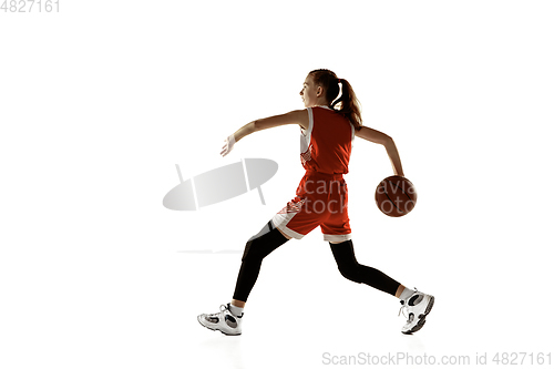 Image of Young caucasian female basketball player against white studio background