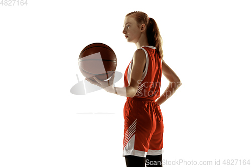 Image of Young caucasian female basketball player against white studio background