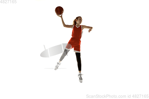 Image of Young caucasian female basketball player against white studio background