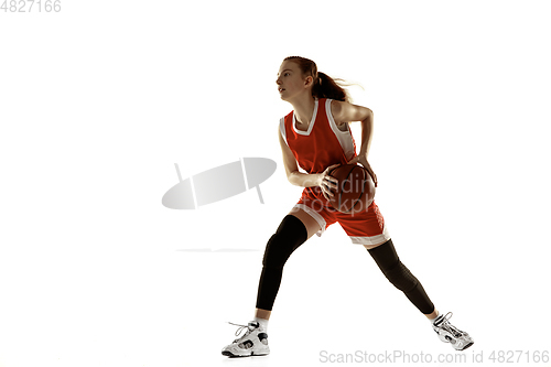 Image of Young caucasian female basketball player against white studio background