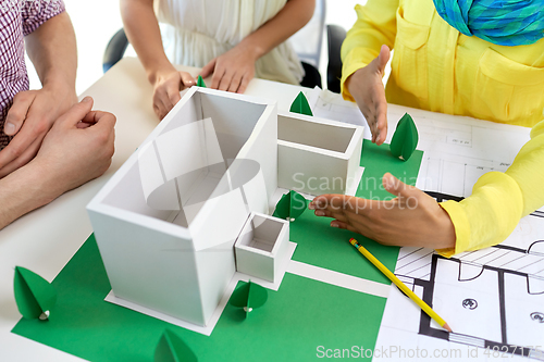 Image of creative team building project layout at office