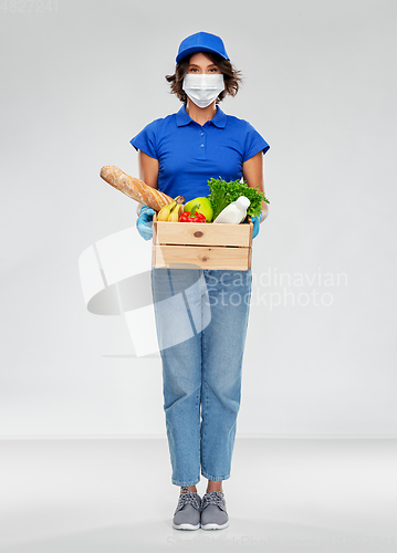 Image of delivery woman in face mask with food in box