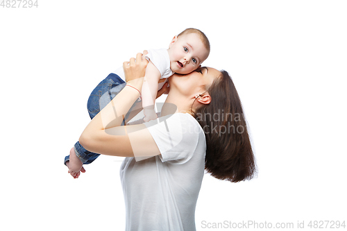 Image of beautiful young mother with toddler baby boy