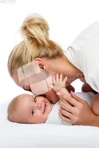 Image of beautiful young mother with toddler baby girl