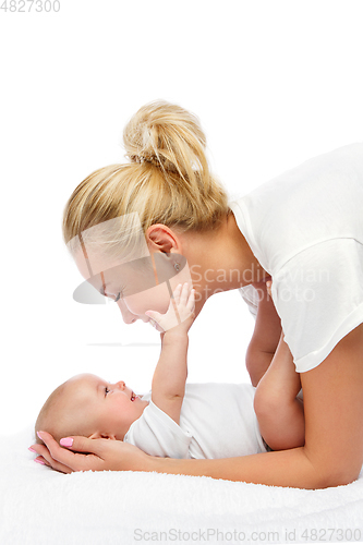 Image of beautiful young mother with toddler baby girl