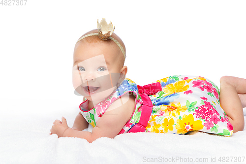 Image of happy beautiful baby girl with crown on head