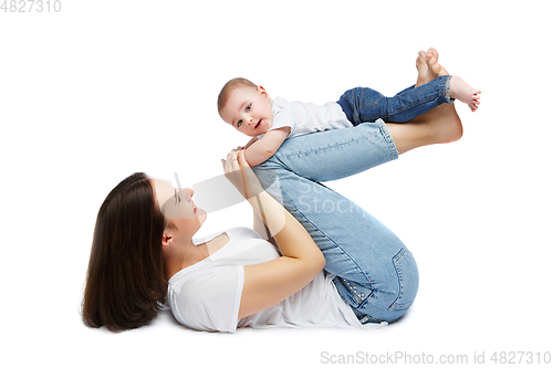 Image of beautiful young mother with toddler baby boy