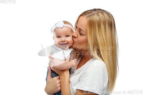 Image of beautiful young mother with toddler baby girl