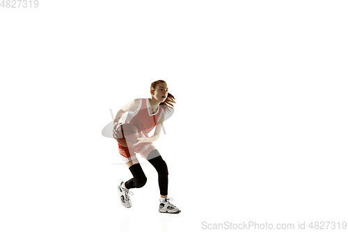 Image of Young caucasian female basketball player against white studio background