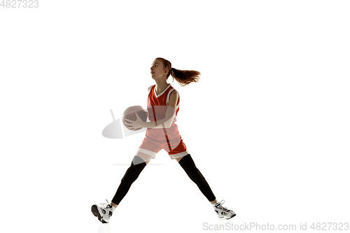 Image of Young caucasian female basketball player against white studio background