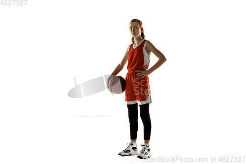 Image of Young caucasian female basketball player against white studio background