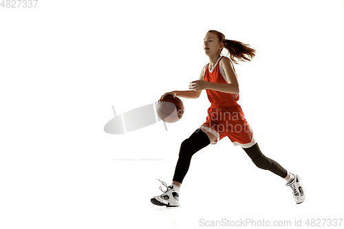 Image of Young caucasian female basketball player against white studio background