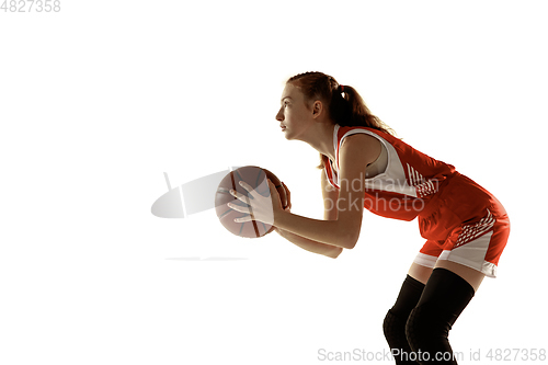 Image of Young caucasian female basketball player against white studio background