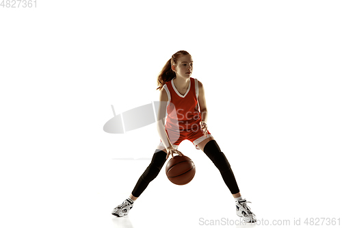 Image of Young caucasian female basketball player against white studio background