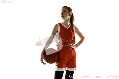 Image of Young caucasian female basketball player against white studio background