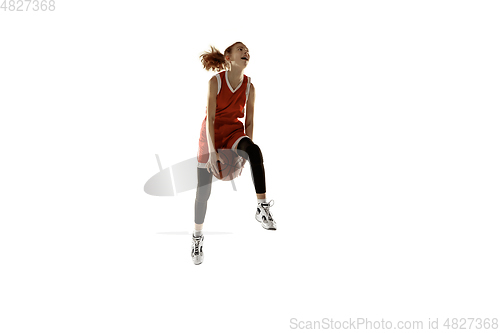 Image of Young caucasian female basketball player against white studio background