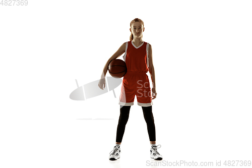 Image of Young caucasian female basketball player against white studio background