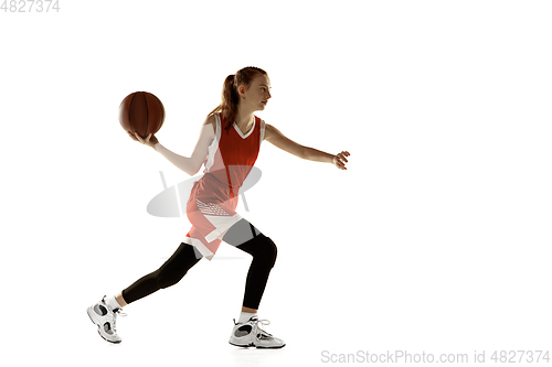 Image of Young caucasian female basketball player against white studio background