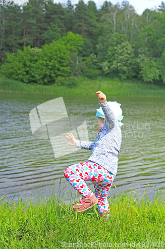 Image of baby falls down to the river