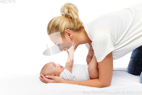 Image of beautiful young mother with toddler baby girl