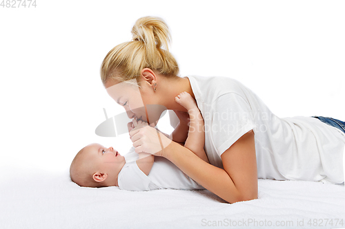 Image of beautiful young mother with toddler baby girl